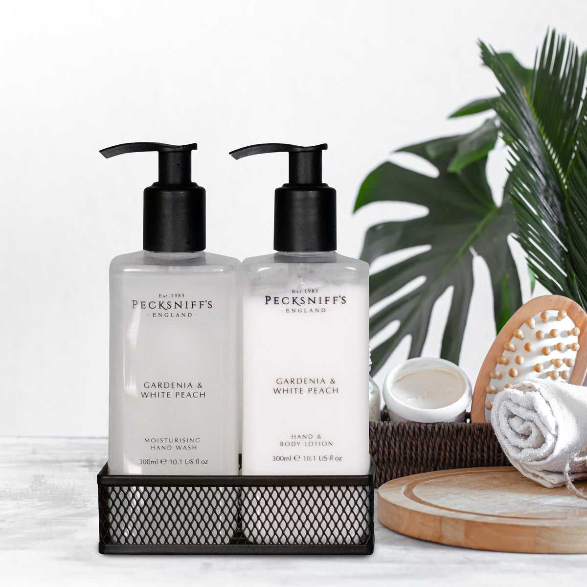 Pecksniffs Gardenia & White Peach Moisturizing Hand Wash and Hand Lotion in a Black Mesh Caddy | 300ml/10.14 Fl oz